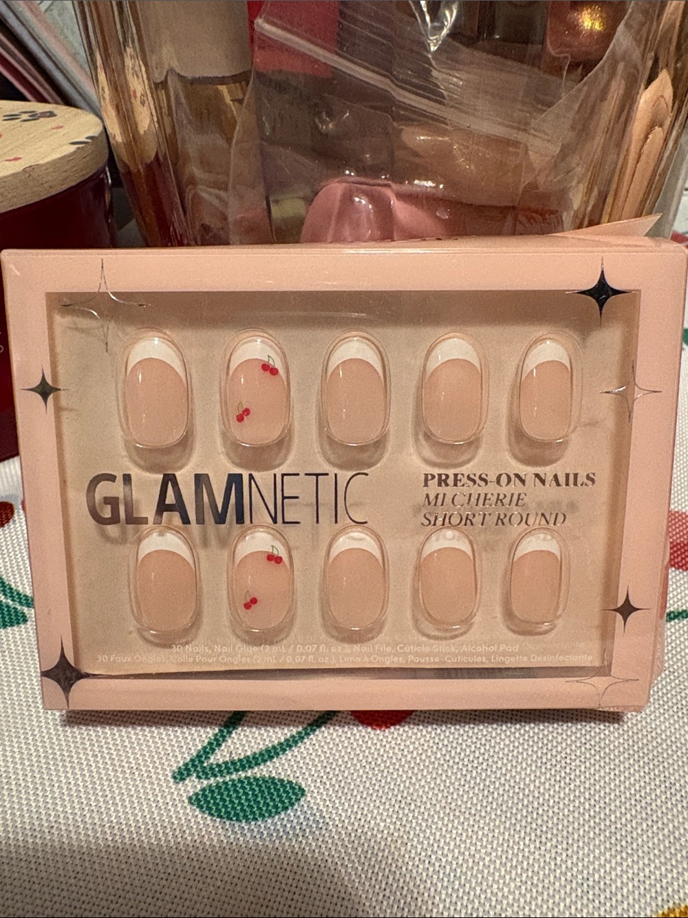 GLAMNETIC M Cherie Short Round Press-On Nails in Nude with Cherry Accent